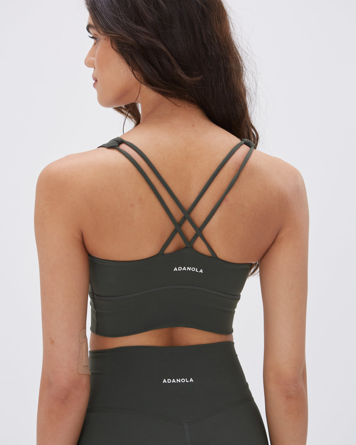 Stay supported during your workouts with Oalka Women's Racerback